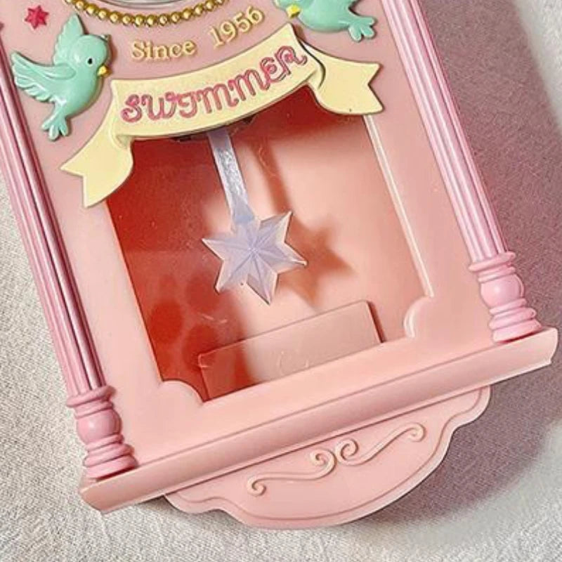 Horloge murale rose miniature 9 x 19 cm, décor d'oiseaux